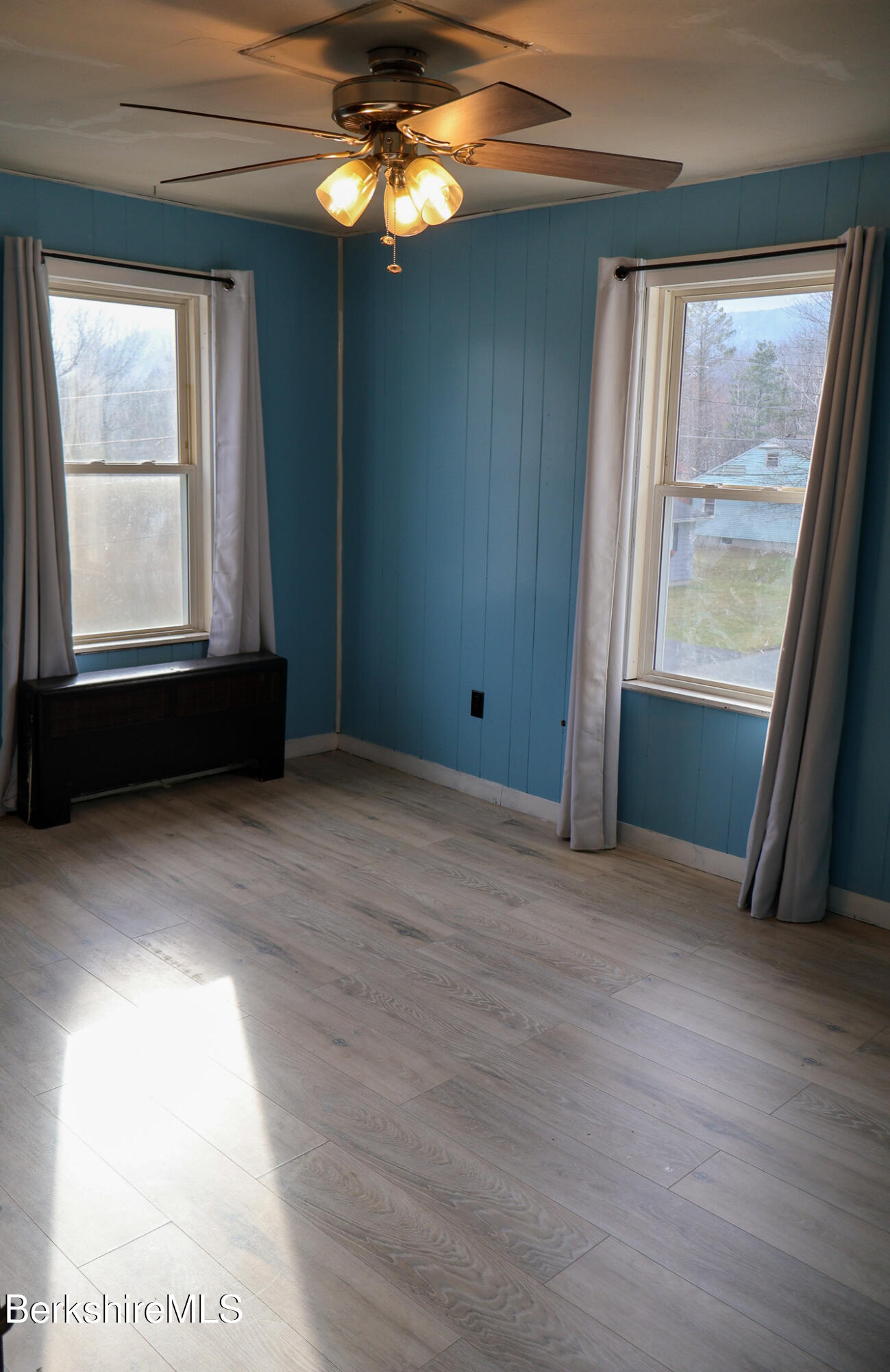9 Beecher Street Adams, MA 01220 - Photo 19 of 23 an empty room with windows and closet