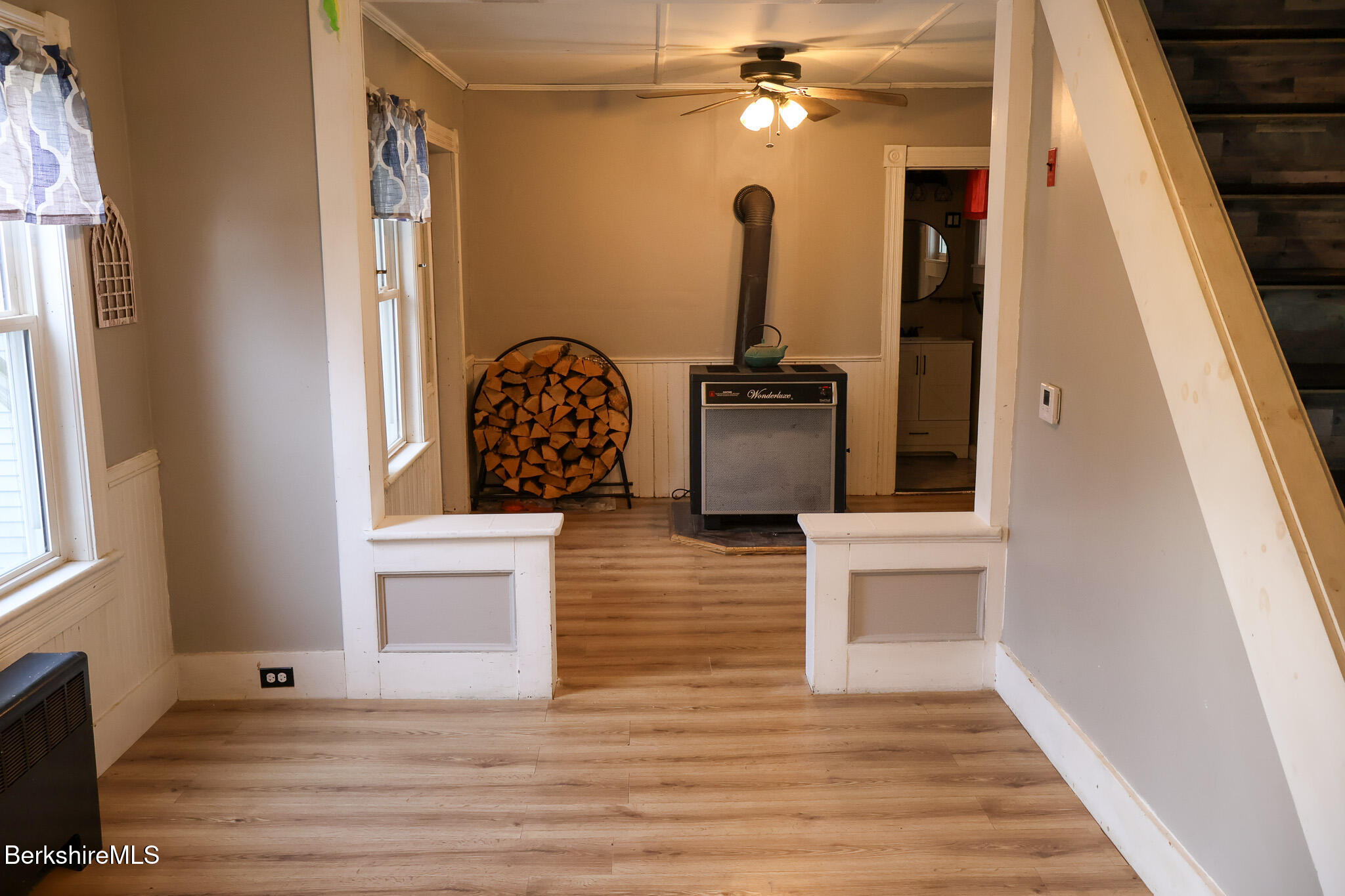 9 Beecher Street Adams, MA 01220 - Photo 10 of 23 a view of a hallway with wooden floor and staircase