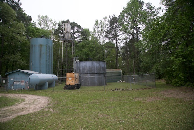 258 Hearne Road Corrigan, TX 75939 - Photo 3 of 7 Damascus Water Supply is next door. Subject property is the right side of photo.