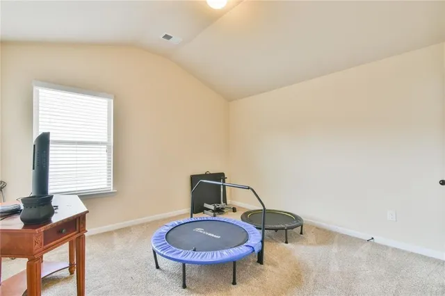 a room with furniture and window