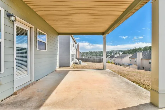 a porch with seating space