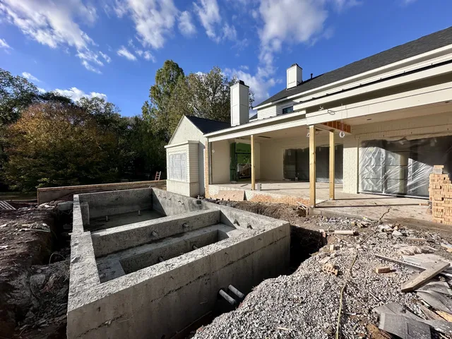 a front view of house with yard and outdoor seating