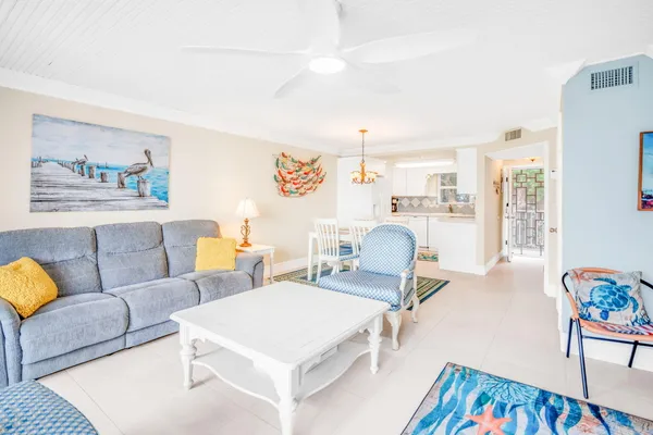 a kitchen with a stove and a white cabinet