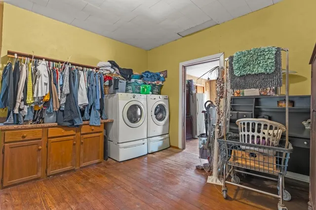 a bedroom with furniture and a window