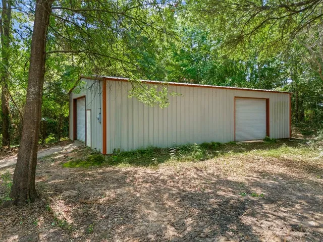 a view of sitting area with furniture and lake view