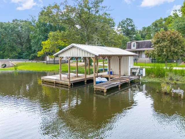 a view of a lake with a house