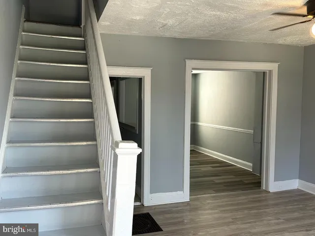 a view of an empty walk in closet