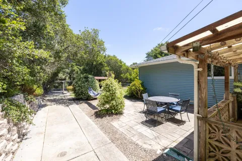 a view of backyard with green space