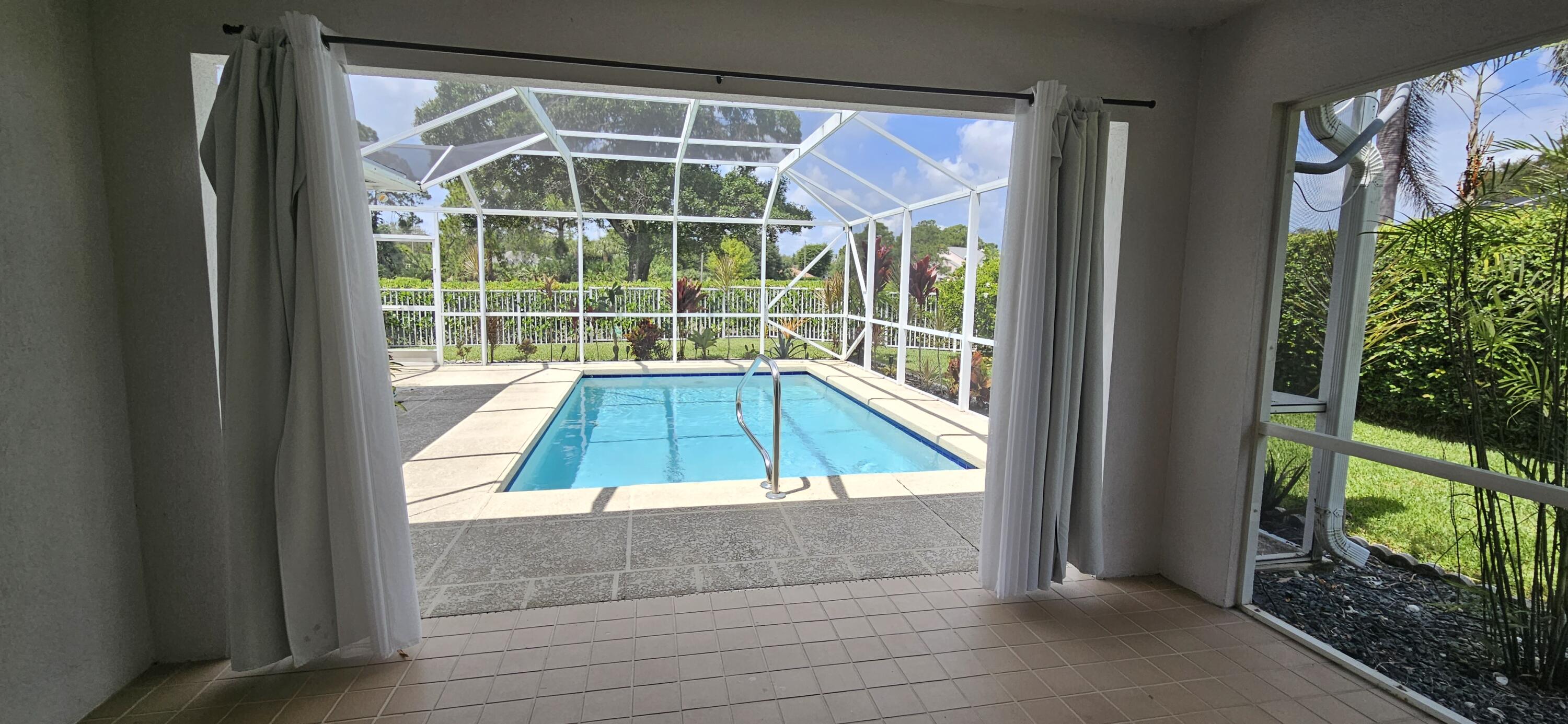 305 Brier Circle Jupiter, FL 33458 - Photo 3 of 32 305 Brier Circle Thom Montrois Remax (3