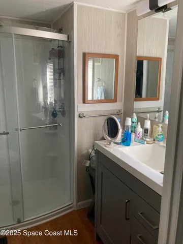 a bedroom with bed and window