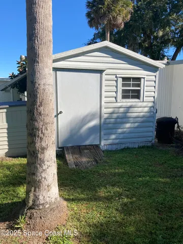 a view of a house with a garden