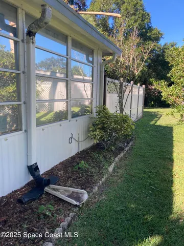 a room with furniture and a flat screen tv