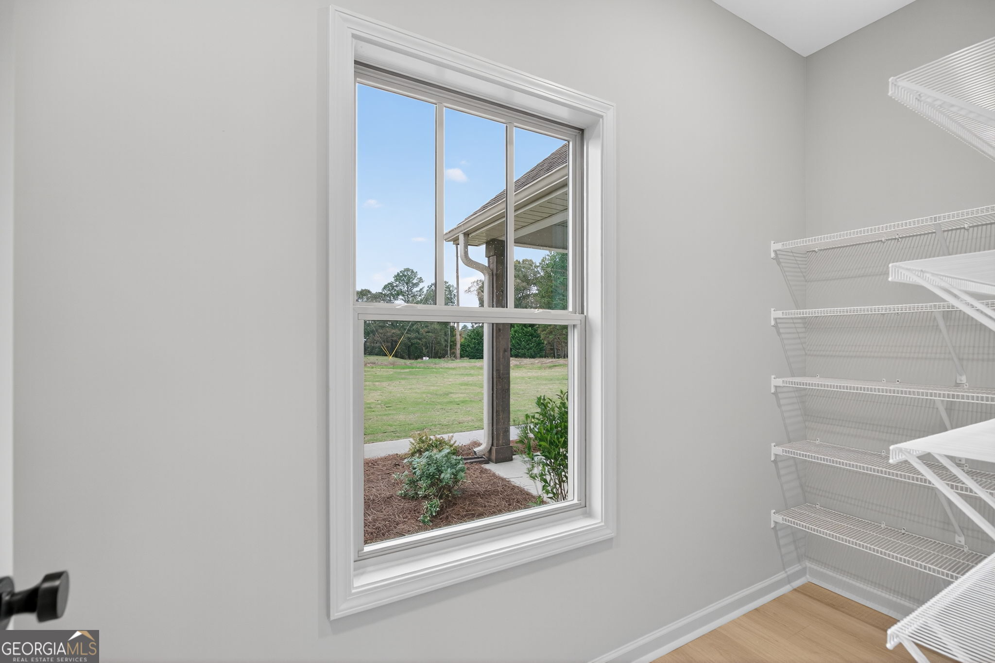 359 Gray Road Roopville, GA 30170 - Photo 23 of 46 a view of a small space with wooden floor and a window