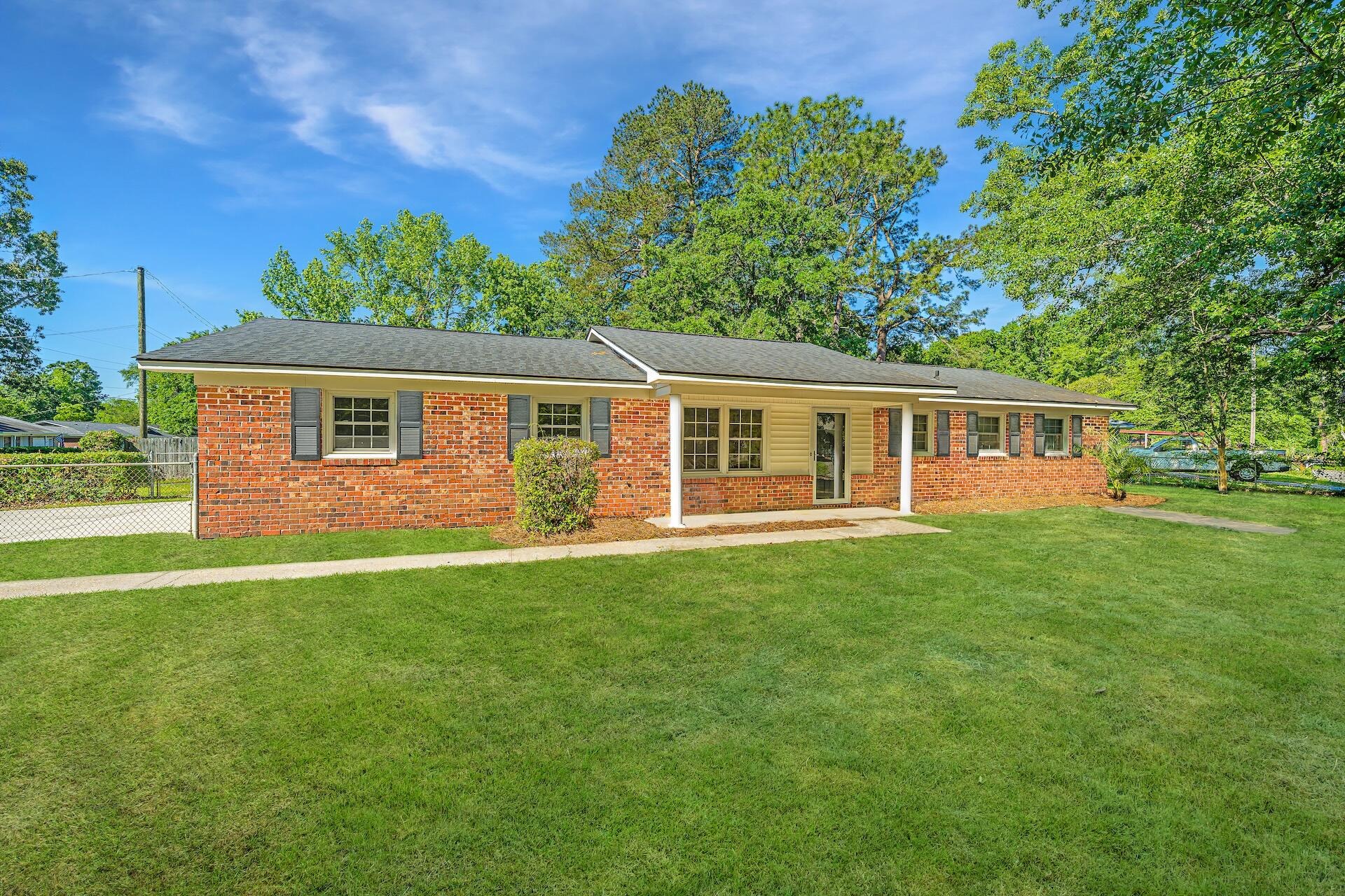 119 Rahway Road Goose Creek, SC 29445 - Photo 1 of 32 Summertime front view