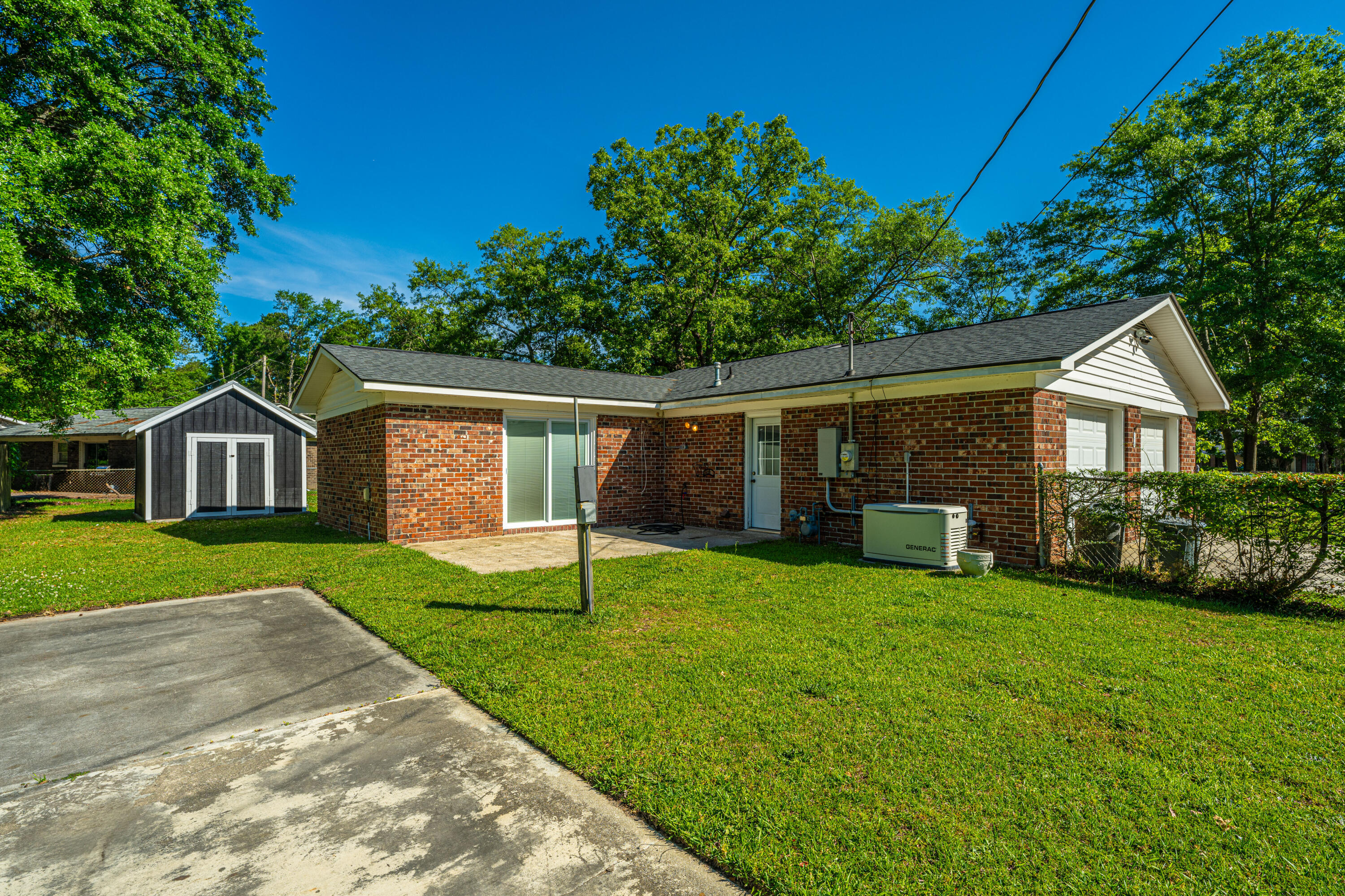 119 Rahway Road Goose Creek, SC 29445 - Photo 4 of 32 Rear patio+pad:outlet:shed