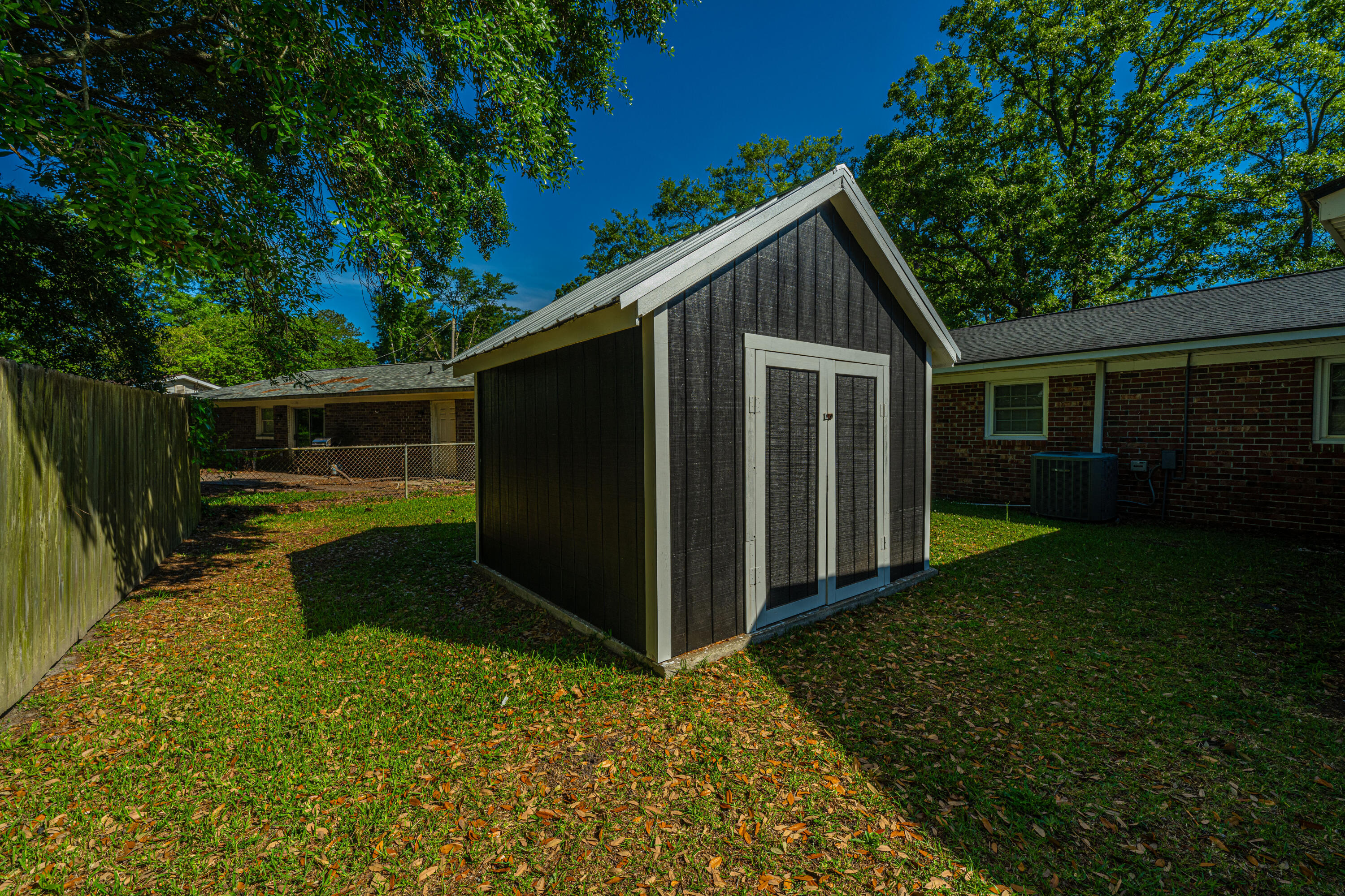 119 Rahway Road Goose Creek, SC 29445 - Photo 5 of 32 Rear shed fence view
