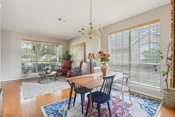 a kitchen with stainless steel appliances granite countertop a stove a sink dishwasher a refrigerator and a microwave oven
