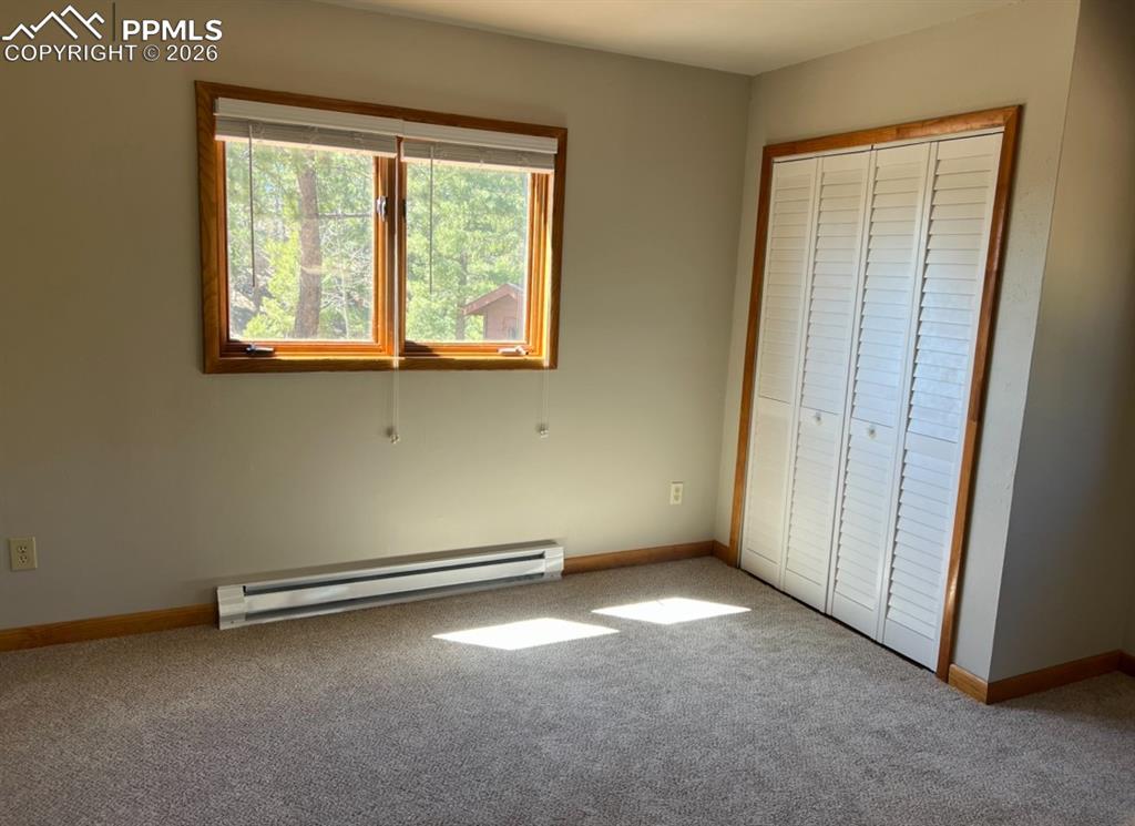 2061 Spruce Road Woodland Park, CO 80863 - Photo 23 of 26 a view of a room with a window