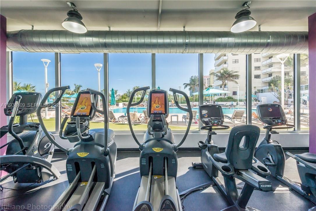 100 Lincoln Road, Unit 1631 Miami Beach, FL 33139 - Photo 13 of 30 a view of a livingroom with furniture and window