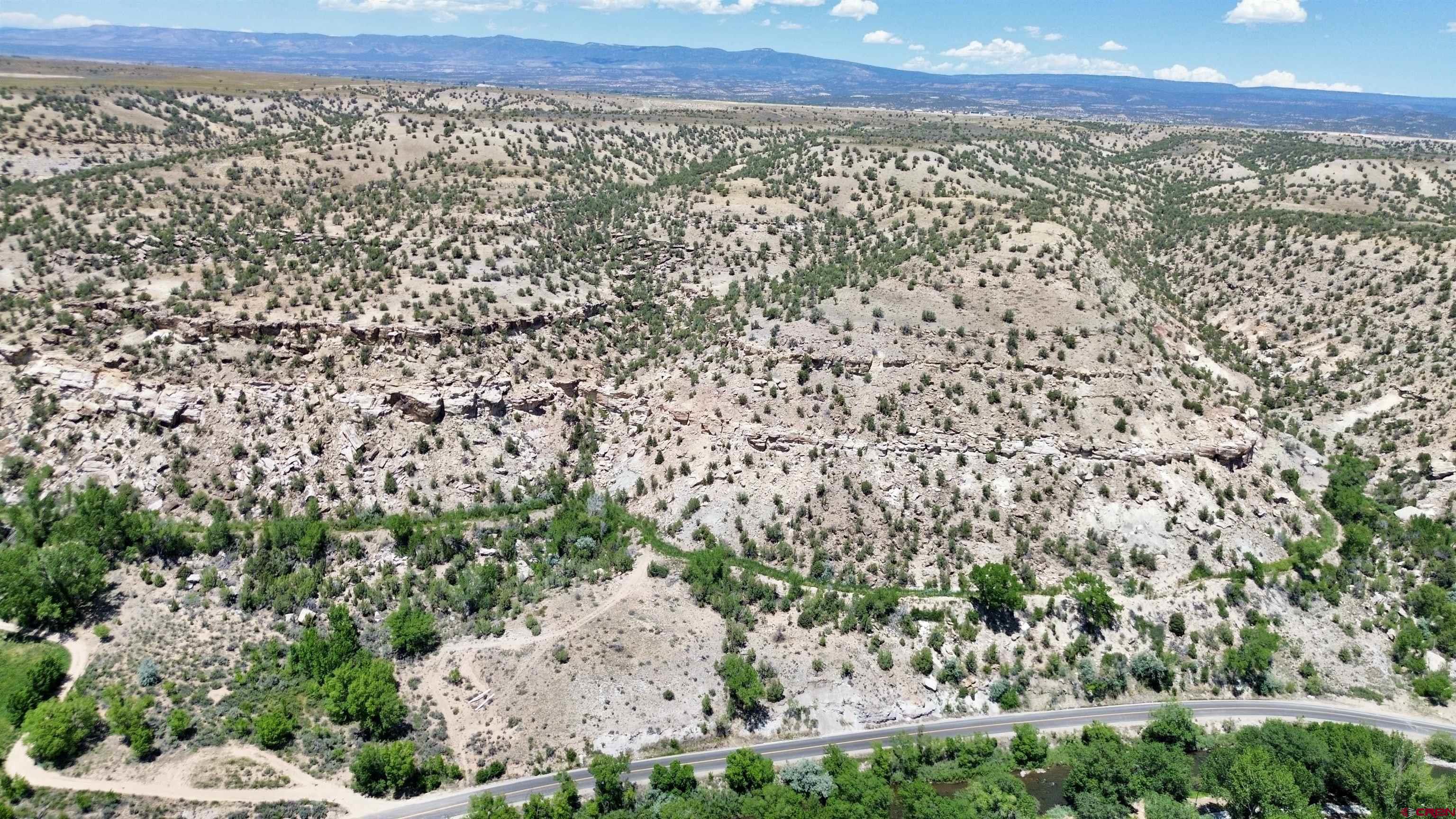 Lot 2 Crabtree Road Naturita, CO 81422 - Photo 2 of 8 a view of a yard with wooden fence