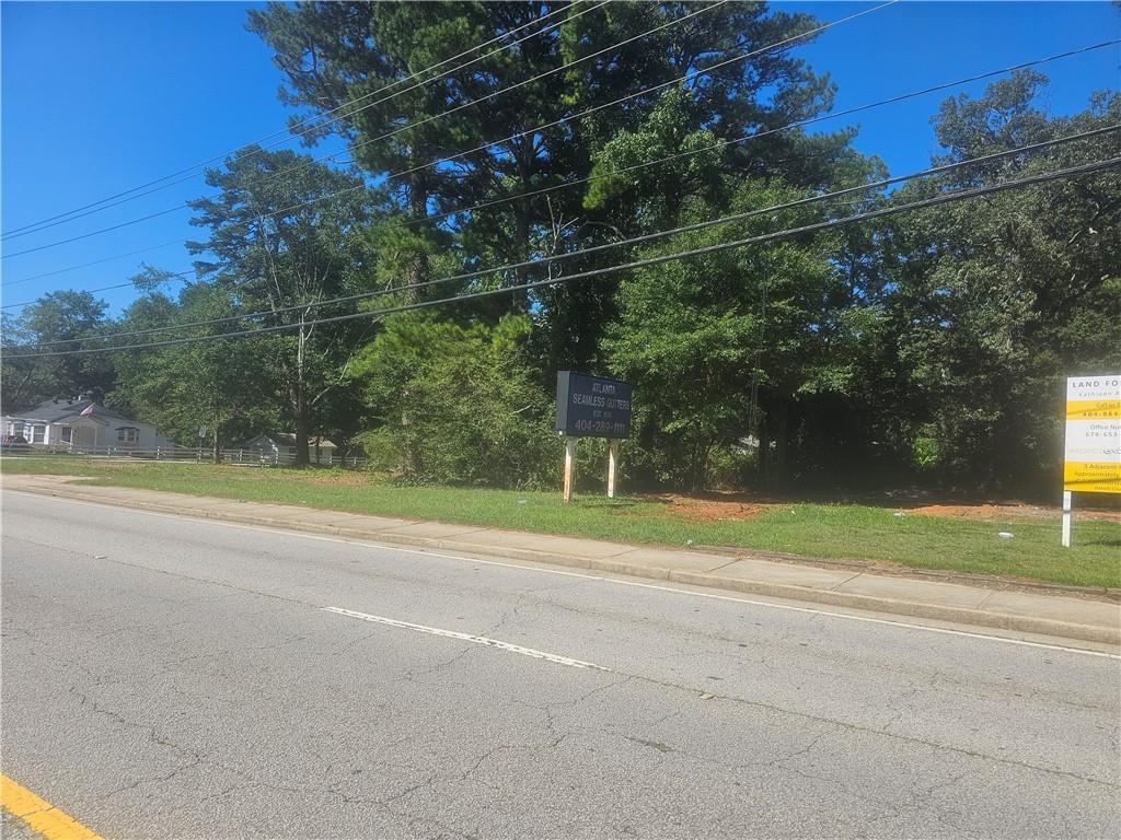 1971 Wesley Chapel Road Decatur, GA 30035 - Photo 10 of 14 a view of a field with a small yard