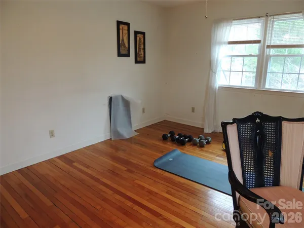 a room with furniture and a window