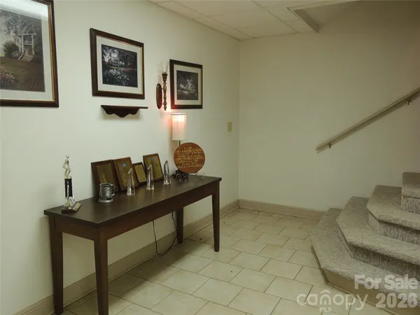 a view of a workspace with furniture