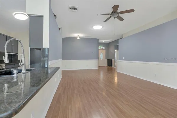 a picture of a bench in a bathroom