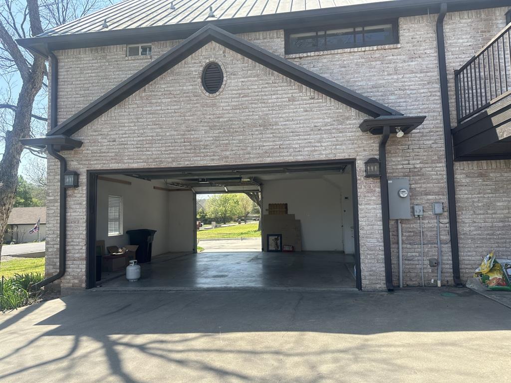 8903 Ravenswood Road Granbury, TX 76049 - Photo 35 of 36 Drive Through Garage