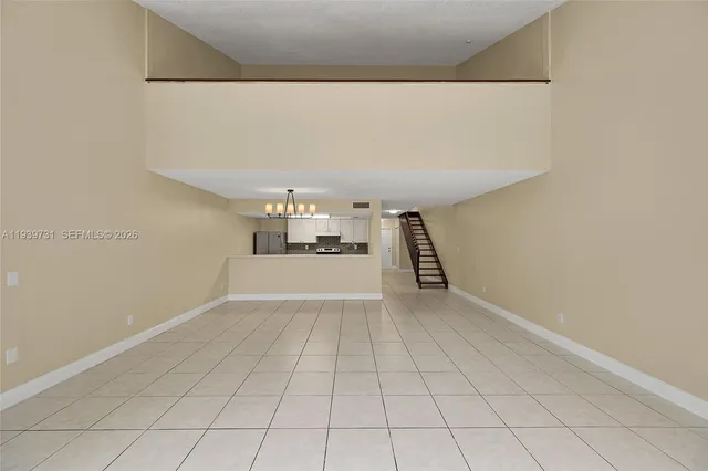 a view of a kitchen with cabinets