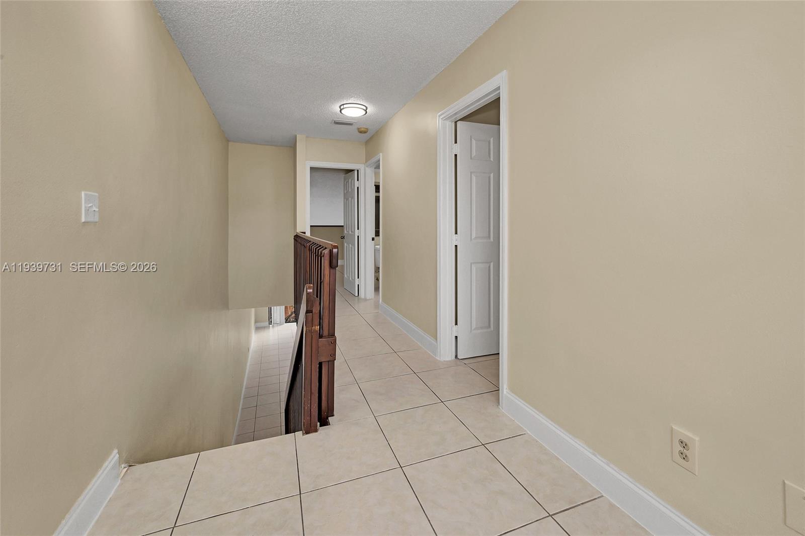 9079 Southwest 133rd Court, Unit F Miami, FL 33186 - Photo 20 of 34 a view of entryway with cabinets