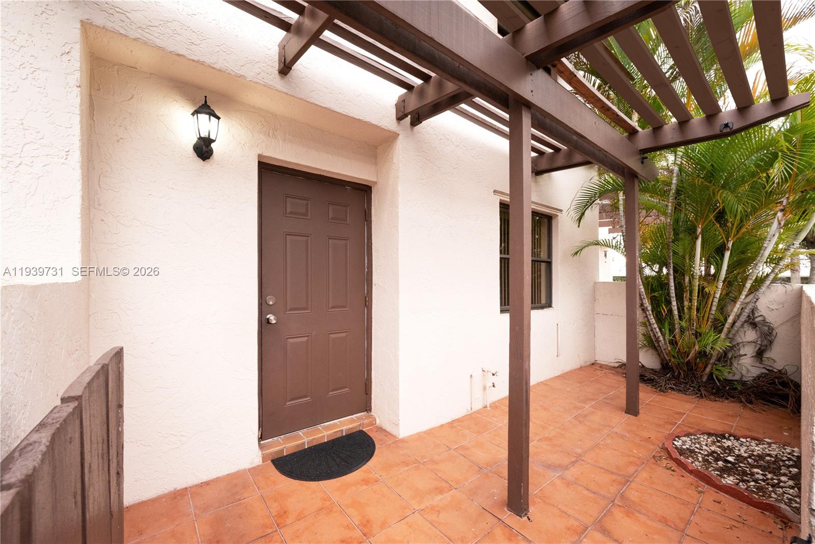 9079 Southwest 133rd Court, Unit F Miami, FL 33186 - Photo 4 of 34 a view of outdoor space