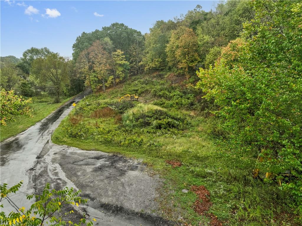 371 North Star Road Imperial, PA 15126 - Photo 21 of 37 a view of a yard with plants and a bench