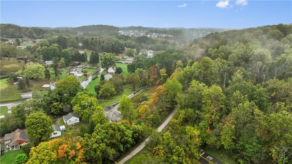 371 North Star Road Imperial, PA 15126 - Photo 29 of 37 a view of a lush green forest with mountains in the background