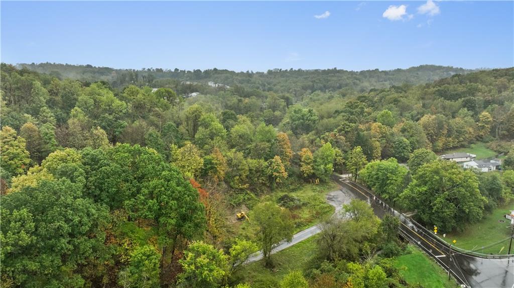 371 North Star Road Imperial, PA 15126 - Photo 33 of 37 a view of a lush green forest with mountains in the background