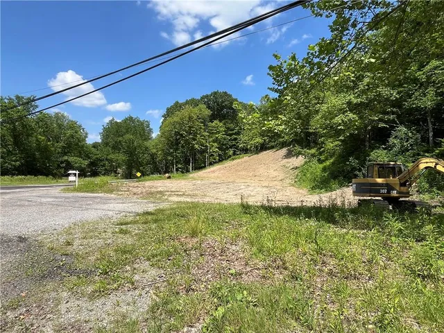 a view of empty yard with trees