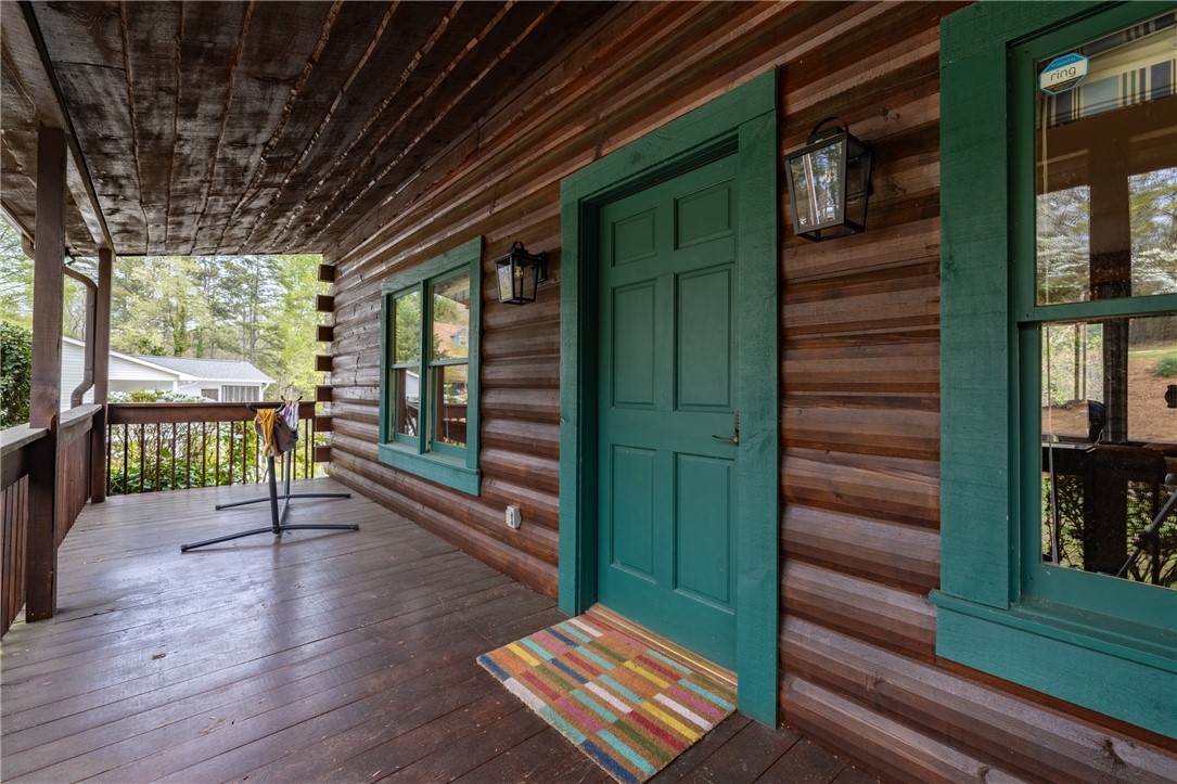 203 Little Lane Seneca, SC 29672 - Photo 6 of 48 This inviting porch welcomes you home with rustic charm and serene outdoor living.