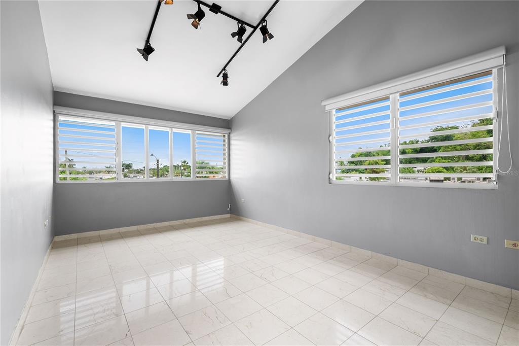 1 Street, Unit 606 Guaynabo, PR 00966 - Photo 17 of 32 a view of a kitchen with a dishwasher and cabinets