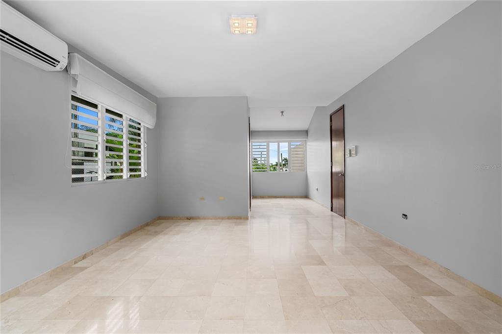1 Street, Unit 606 Guaynabo, PR 00966 - Photo 24 of 32 a view of an empty room with a window