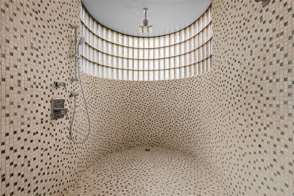 1 Street, Unit 606 Guaynabo, PR 00966 - Photo 30 of 32 a bathroom with a shower