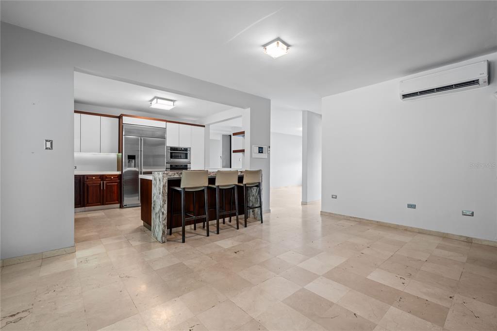 1 Street, Unit 606 Guaynabo, PR 00966 - Photo 8 of 32 a view of a big room with chairs