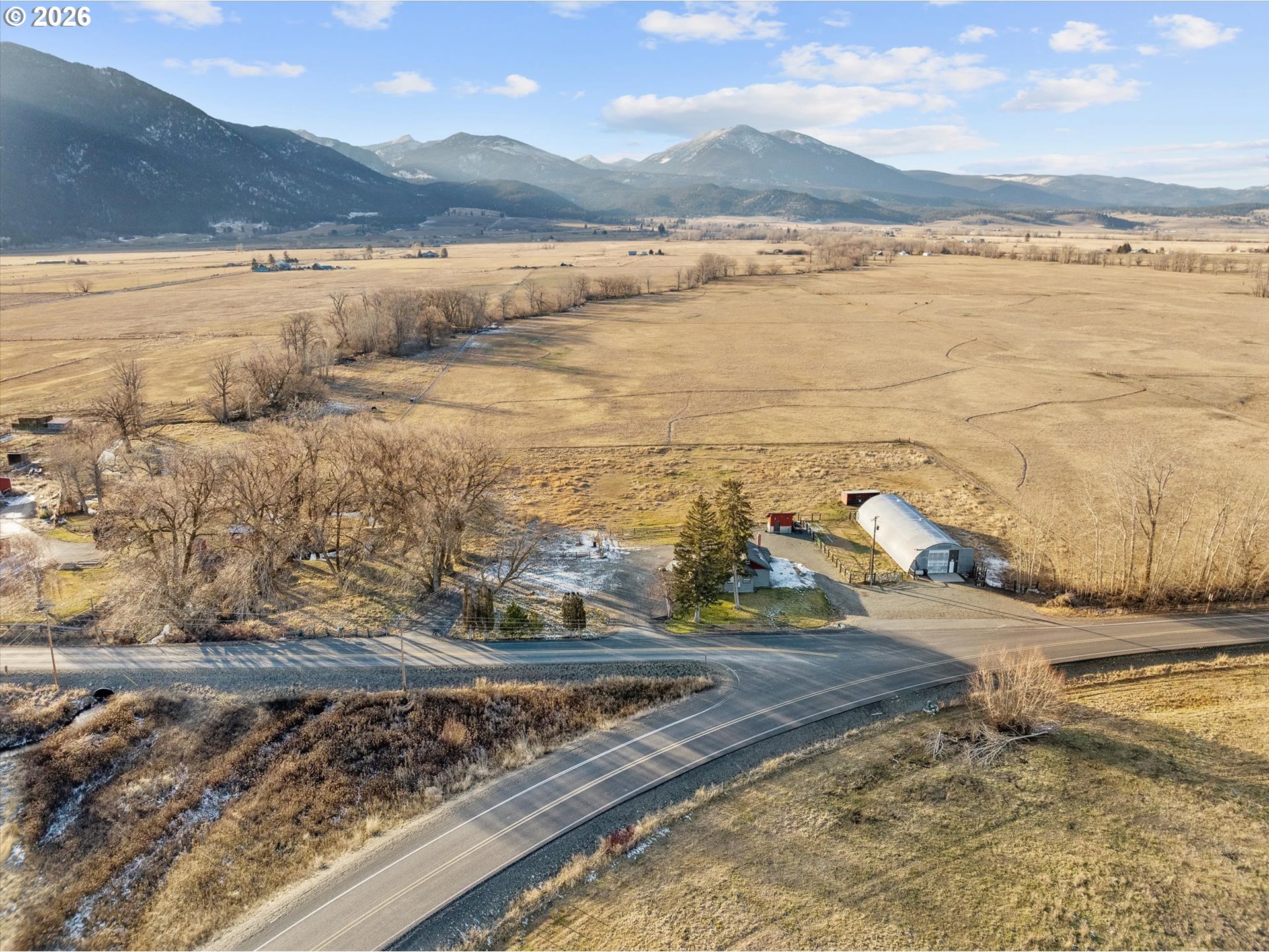 a view of an ocean and mountain