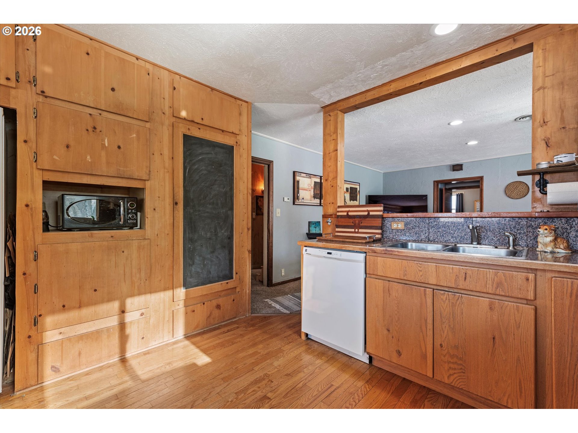 46278 Pocahontas Road Haines, OR 97833 - Photo 20 of 42 a kitchen with stainless steel appliances kitchen island granite countertop a refrigerator and a stove top oven