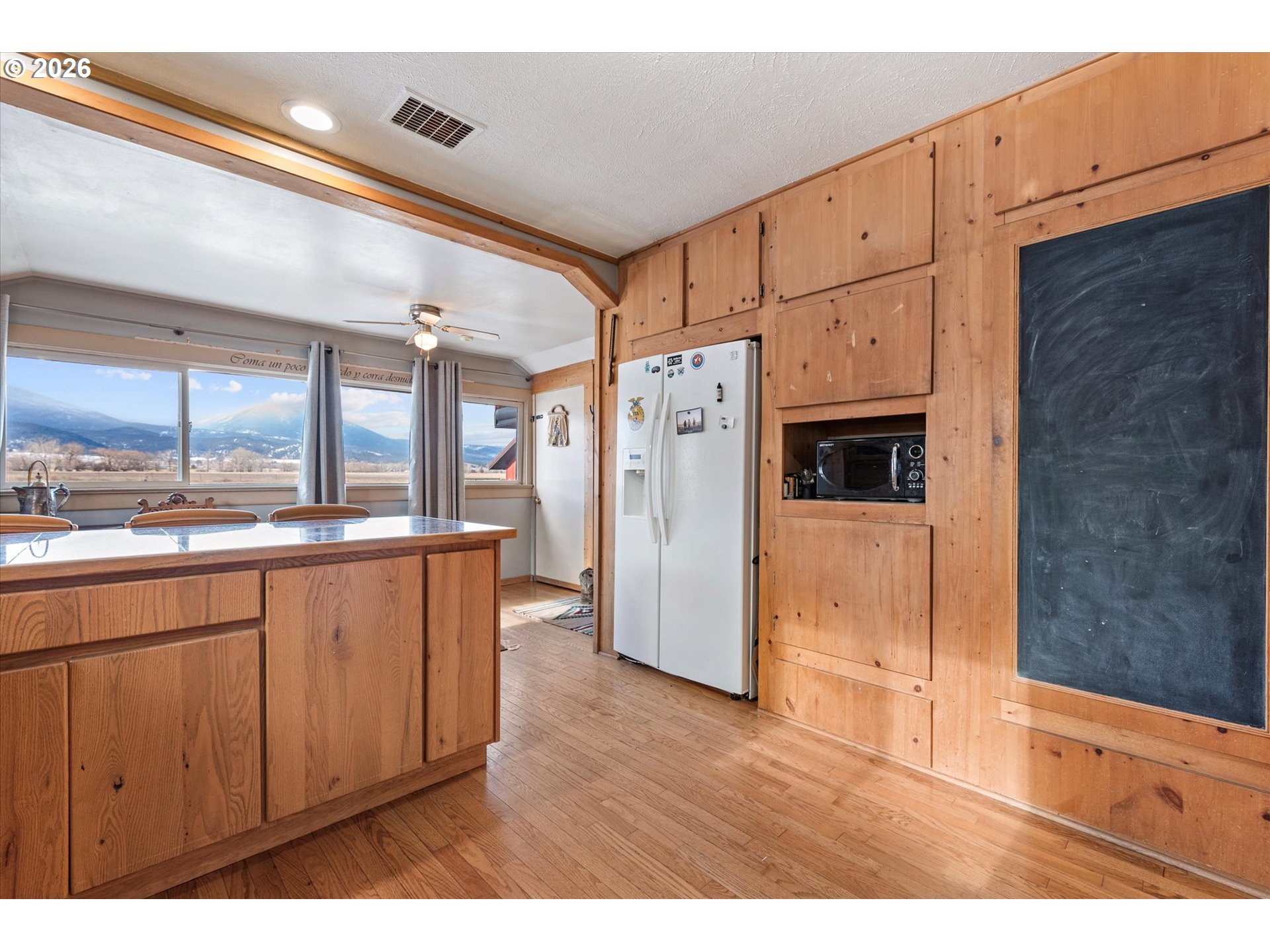46278 Pocahontas Road Haines, OR 97833 - Photo 21 of 42 a kitchen with stainless steel appliances a refrigerator and a sink