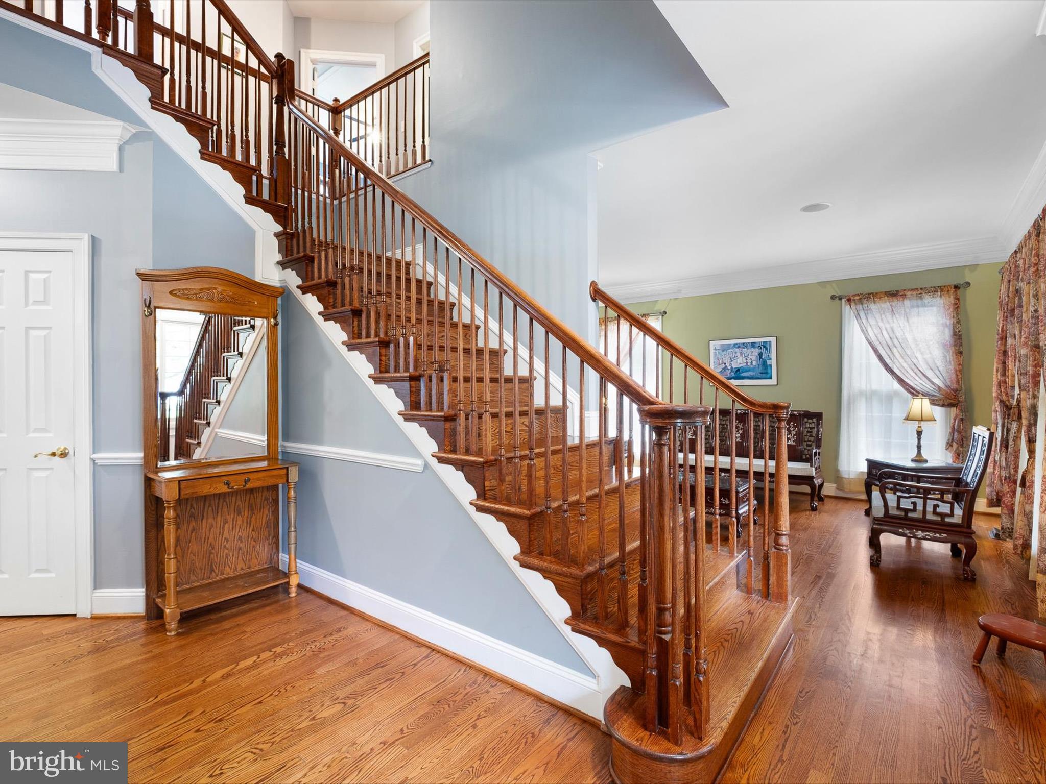 434 Spring Hollow Drive Middletown, DE 19709 - Photo 15 of 59 a view of entryway and hall with wooden floor