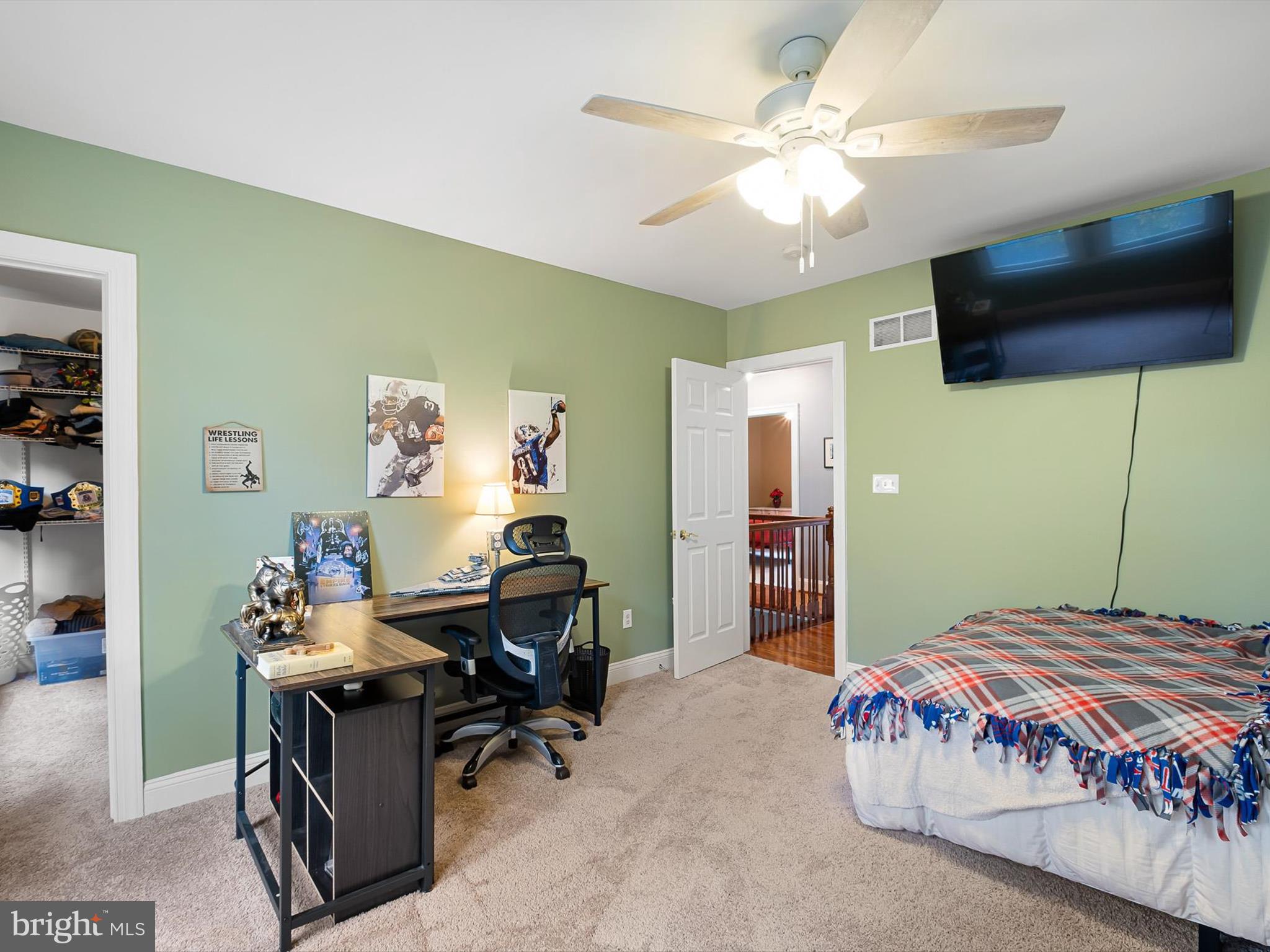 434 Spring Hollow Drive Middletown, DE 19709 - Photo 34 of 59 a bedroom with a bed and a chandelier