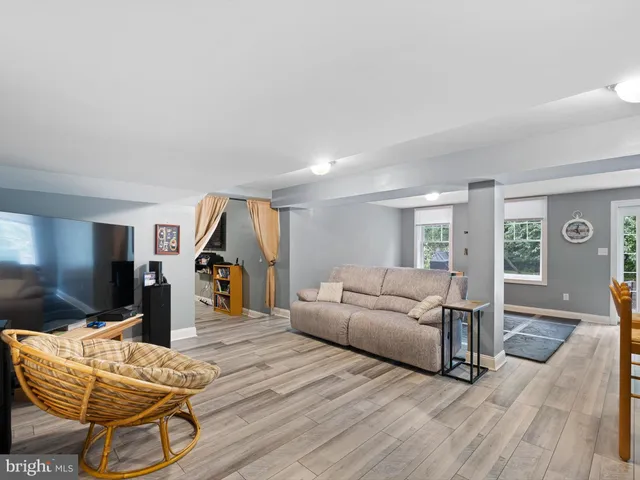 a bedroom with a bed and a lamp