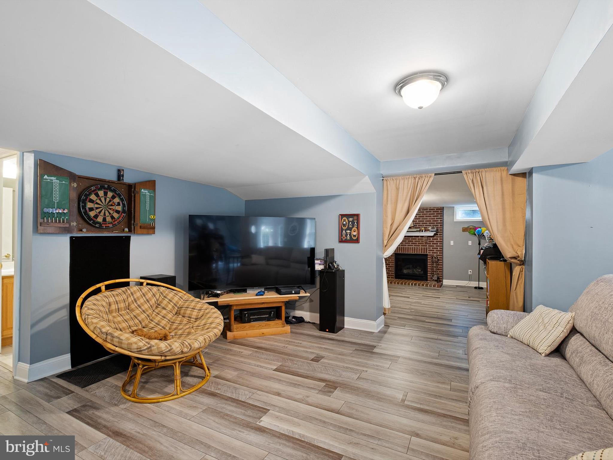 434 Spring Hollow Drive Middletown, DE 19709 - Photo 43 of 59 a living room with furniture and a wooden floor
