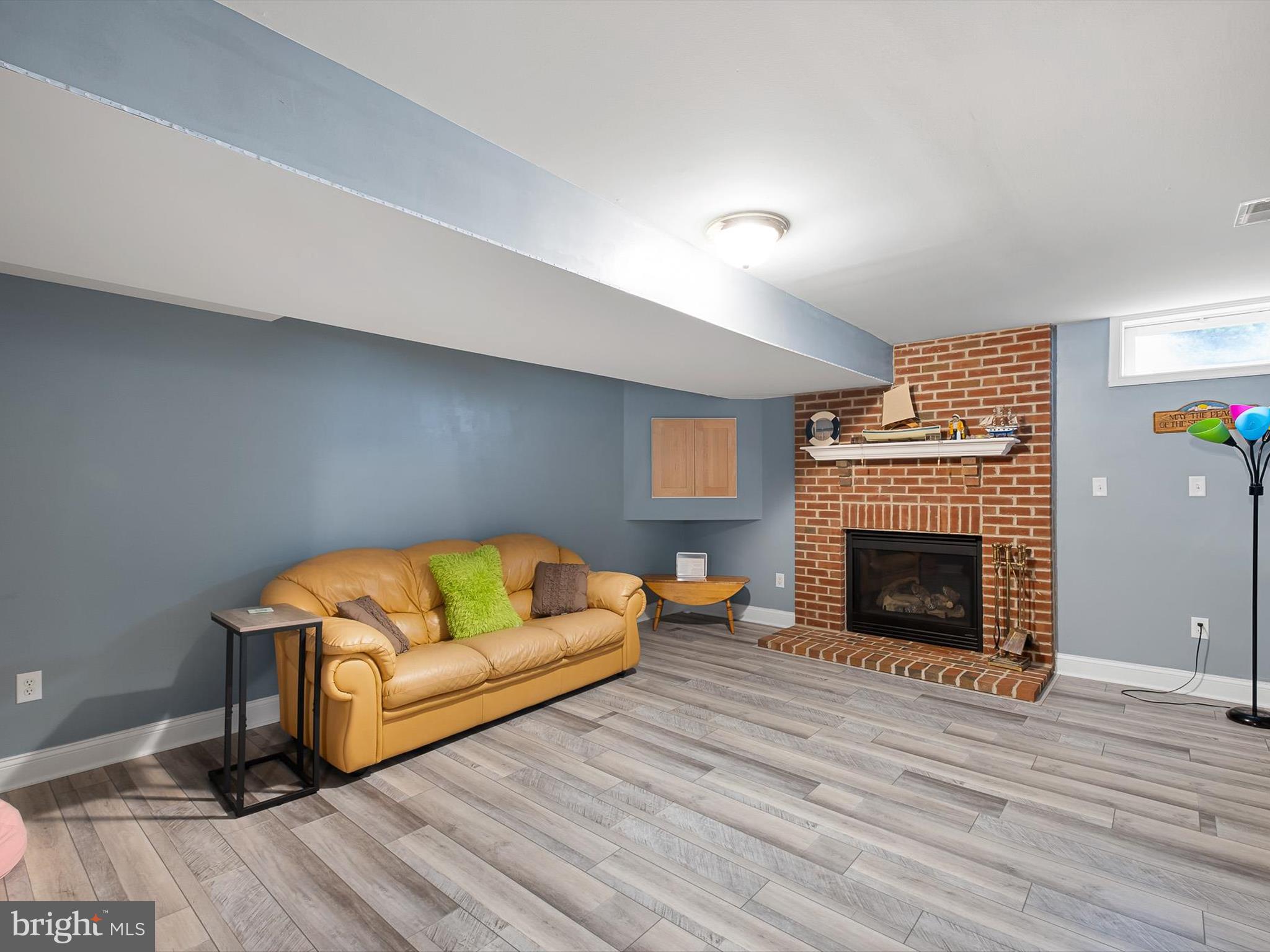 434 Spring Hollow Drive Middletown, DE 19709 - Photo 46 of 59 a living room with furniture and a fireplace
