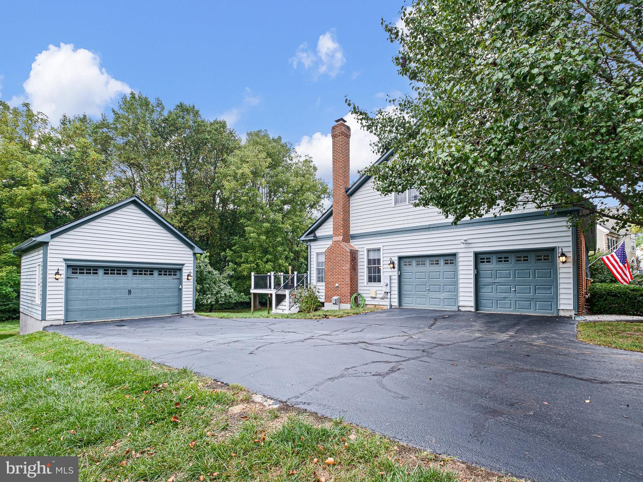 434 Spring Hollow Drive Middletown, DE 19709 - Photo 5 of 59 a front view of a house with a yard and garage